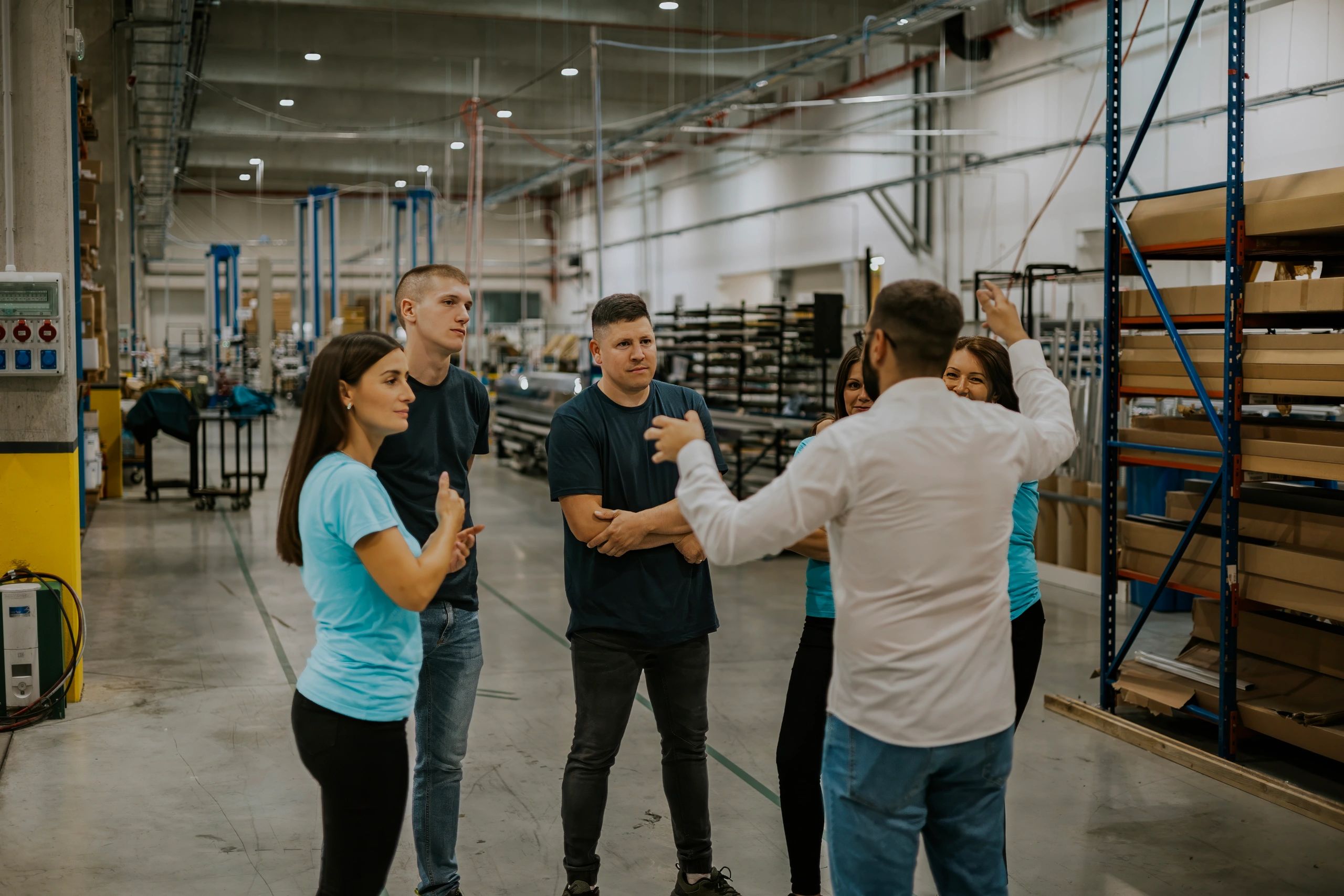 Plant operations team discussing factory processes