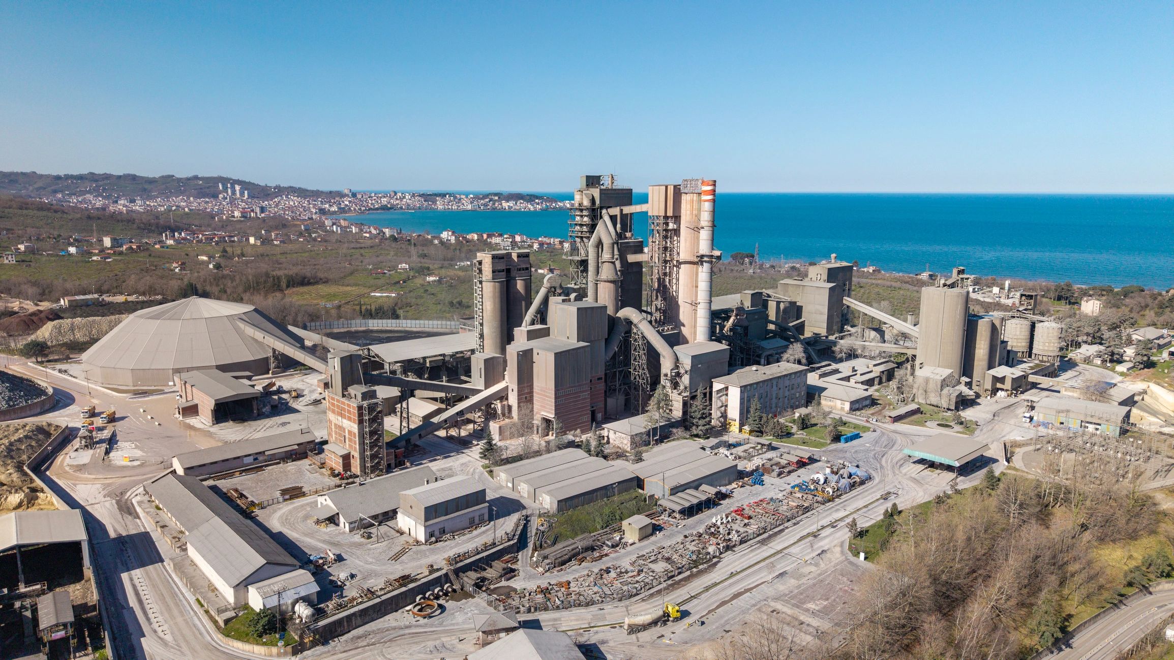 Industrial cement plant near coastline